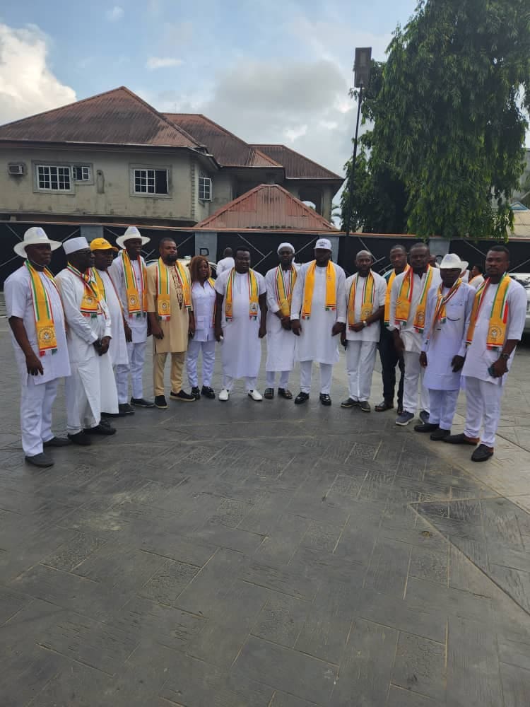 NYCN leaders in white attire and youth council sashes standing together